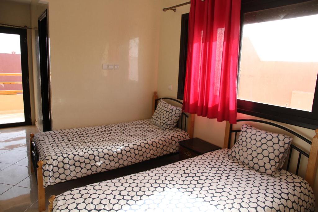 Postel nebo postele na pokoji v ubytování Travel Surf Morocco