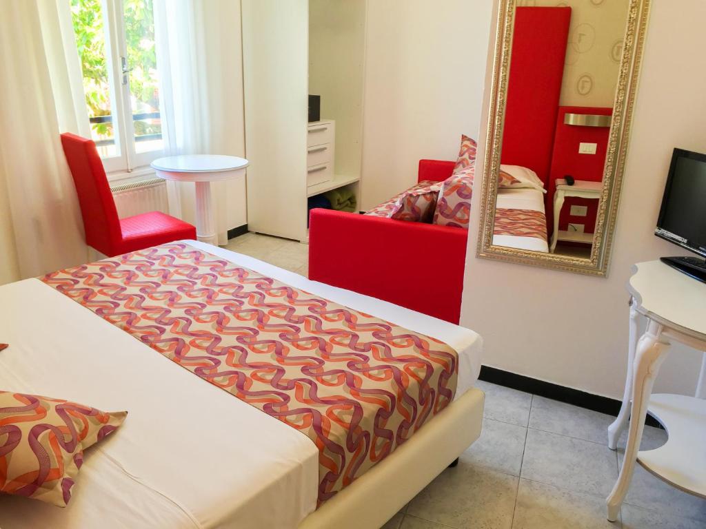 TV a/nebo společenská místnost v ubytování Hotel Souvenir