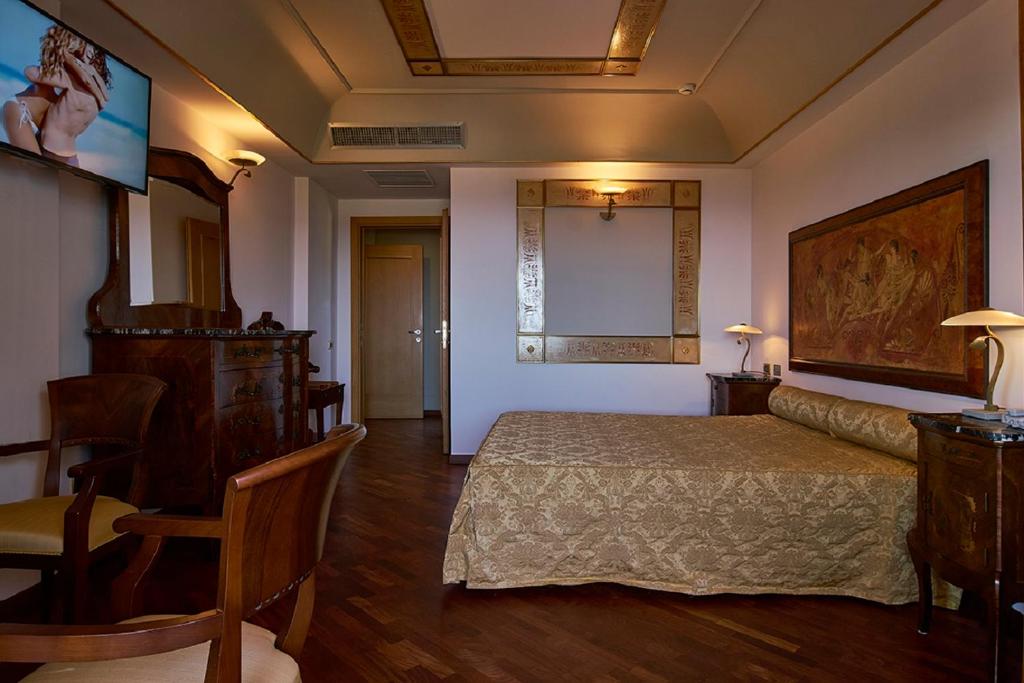 Postel nebo postele na pokoji v ubytování Hotel Tritone Lipari
