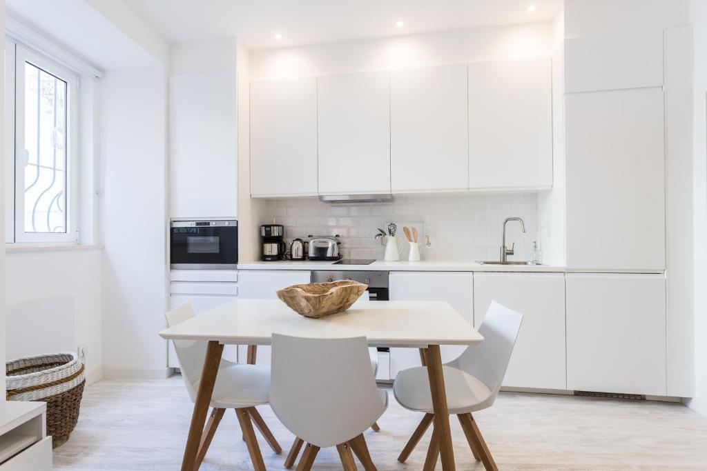 Kuchyň nebo kuchyňský kout v ubytování FLH Graça Cozy Flat