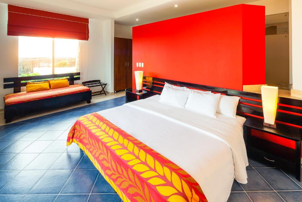 Postel nebo postele na pokoji v ubytování Decameron Barú - All Inclusive