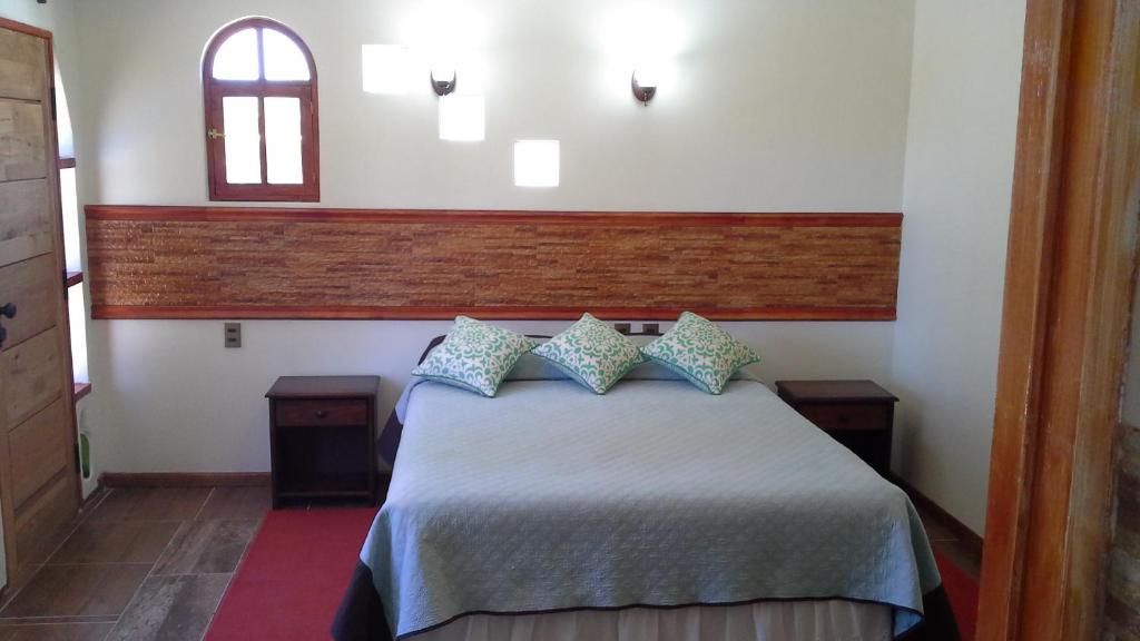 Postel nebo postele na pokoji v ubytování Hostal Puritama