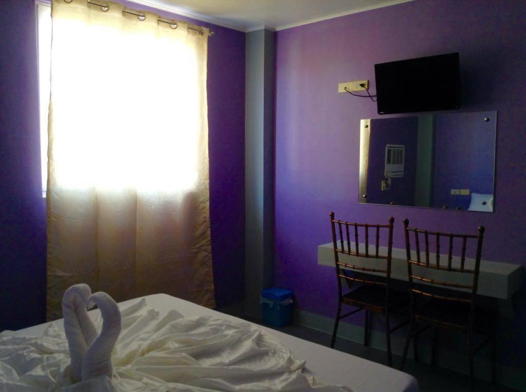 Postel nebo postele na pokoji v ubytování UKL Ever Resort Hotel