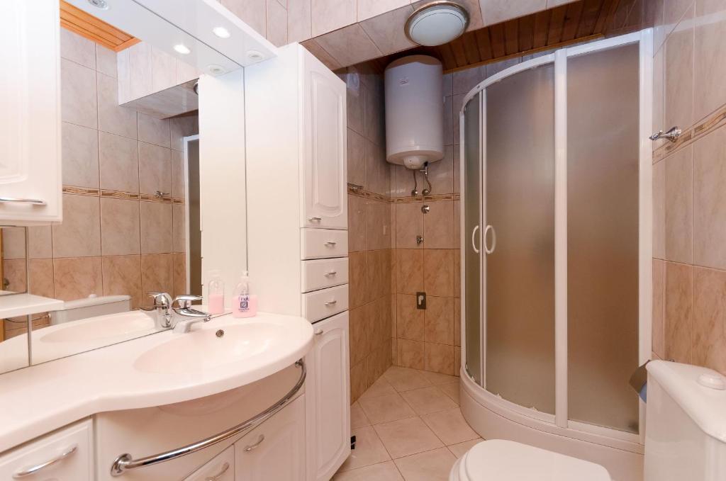 Kúpeľňa v ubytovaní Apartments Maravera