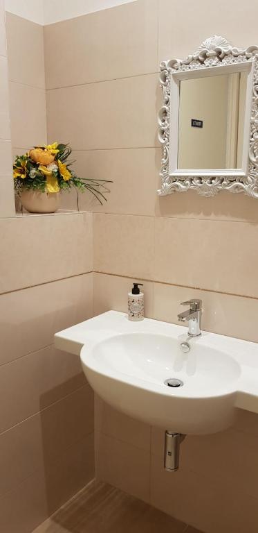 Koupelna v ubytování Hotel Basilea