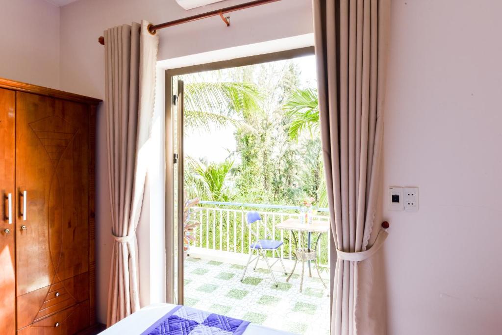 Balkón nebo terasa v ubytování Tra Que Riverside Homestay