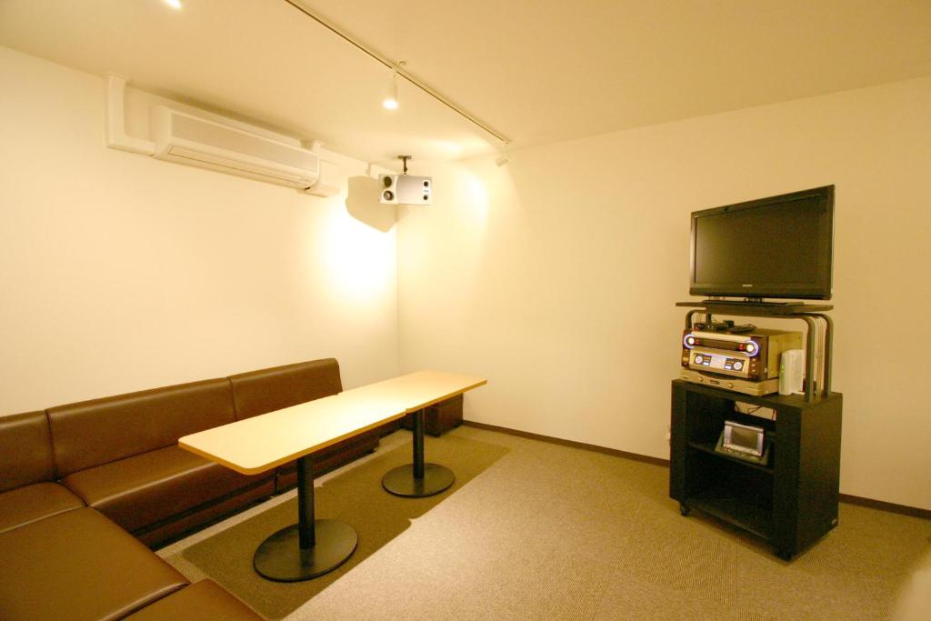 TV a/nebo společenská místnost v ubytování LiVEMAX Resort Atami Forest