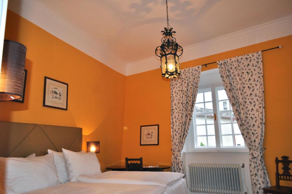 Posteľ alebo postele v izbe v ubytovaní Schlosshotel Mailberg