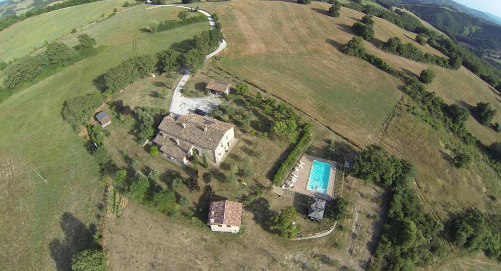 an aerial view of a house on a hill at Caiferri Agriturismo in Gubbio