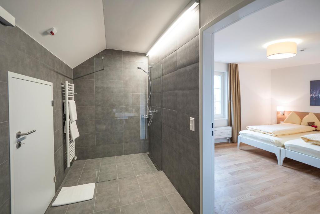 Postel nebo postele na pokoji v ubytování Aparthotel Bären