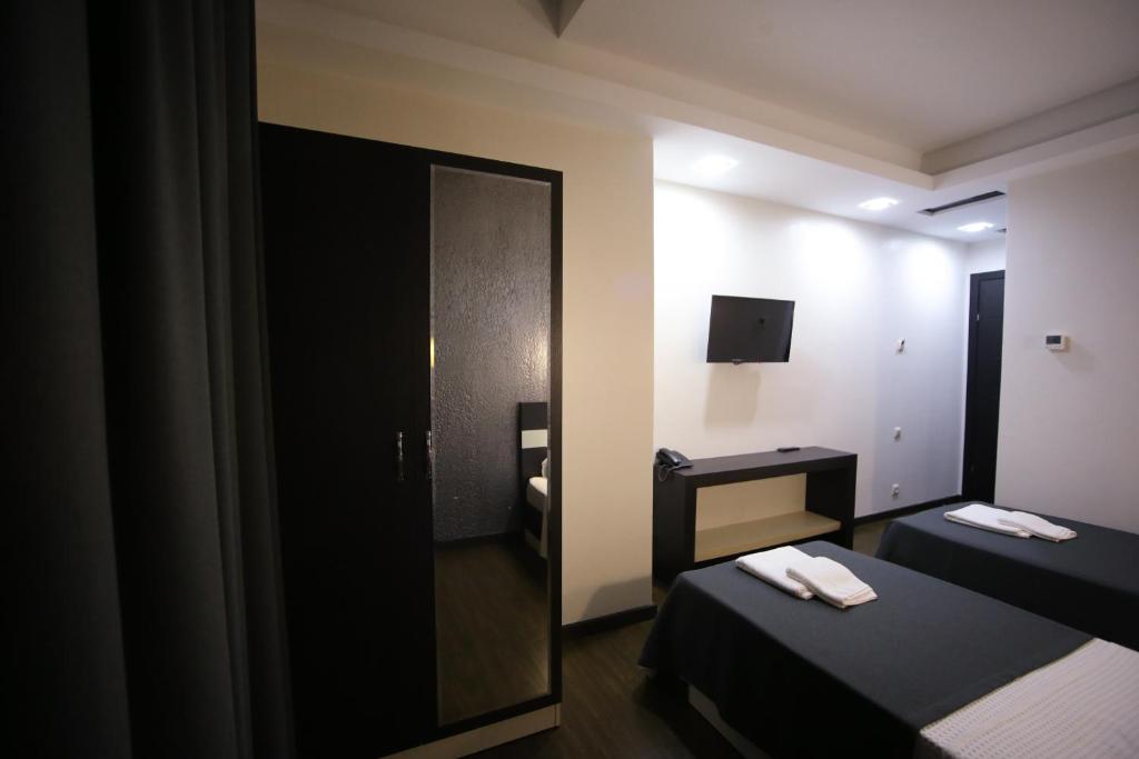 Voodi või voodid majutusasutuse West Tower Hotel toas