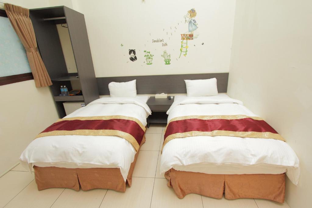 Postel nebo postele na pokoji v ubytování Sanyi Sakura Resort