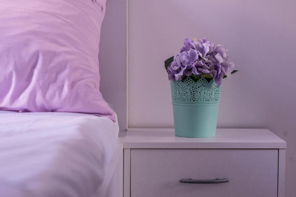 Postel nebo postele na pokoji v ubytování Apartments Svijet Mora 2