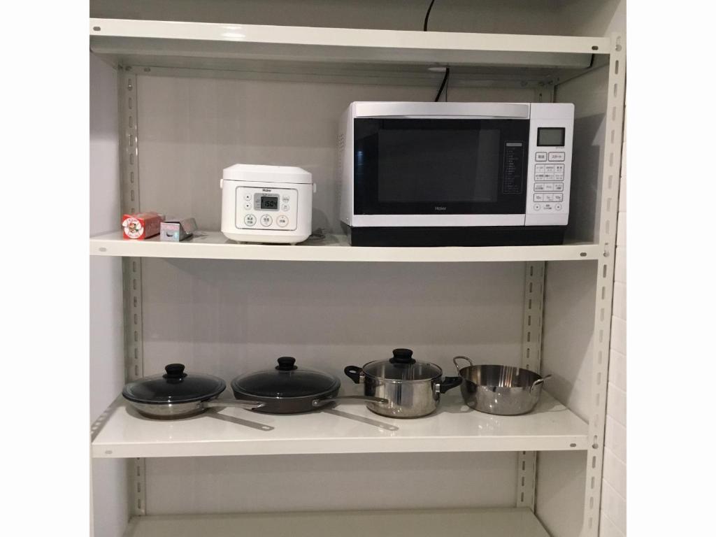 Kuchyň nebo kuchyňský kout v ubytování White Hostel Shinsaibashi