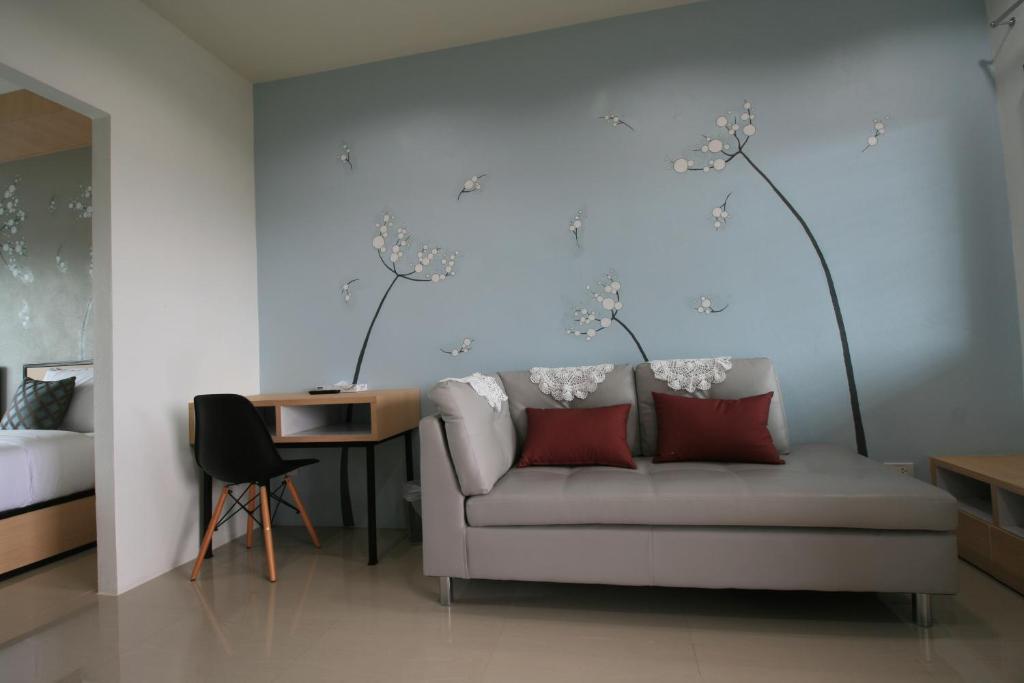 Posezení v ubytování Sirimunta Hotel Chiang Rai Suite & Residence
