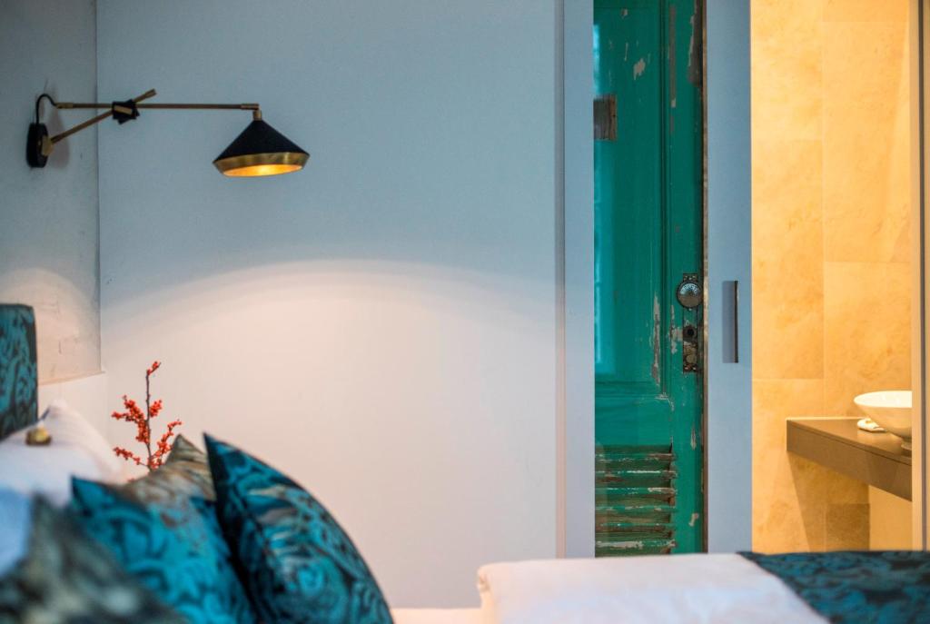 Postel nebo postele na pokoji v ubytování Hotel Oderberger