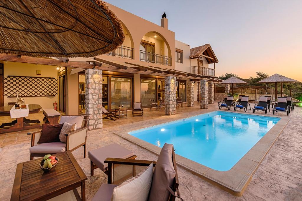 The swimming pool at or close to Butterfly Villa with stunning Sea and Valley Views