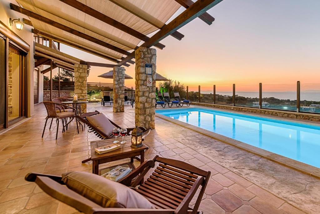 The swimming pool at or close to Butterfly Villa with stunning Sea and Valley Views