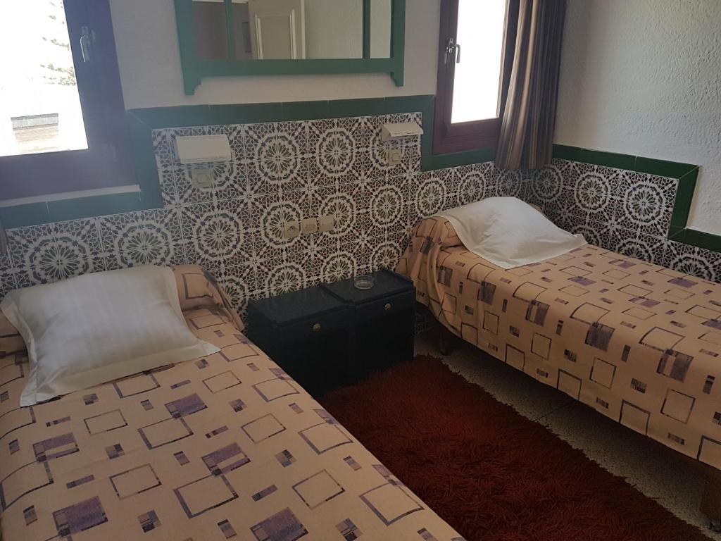Postel nebo postele na pokoji v ubytování Residence Yasmina Agadir