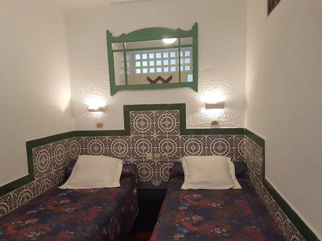 Postel nebo postele na pokoji v ubytování Residence Yasmina Agadir
