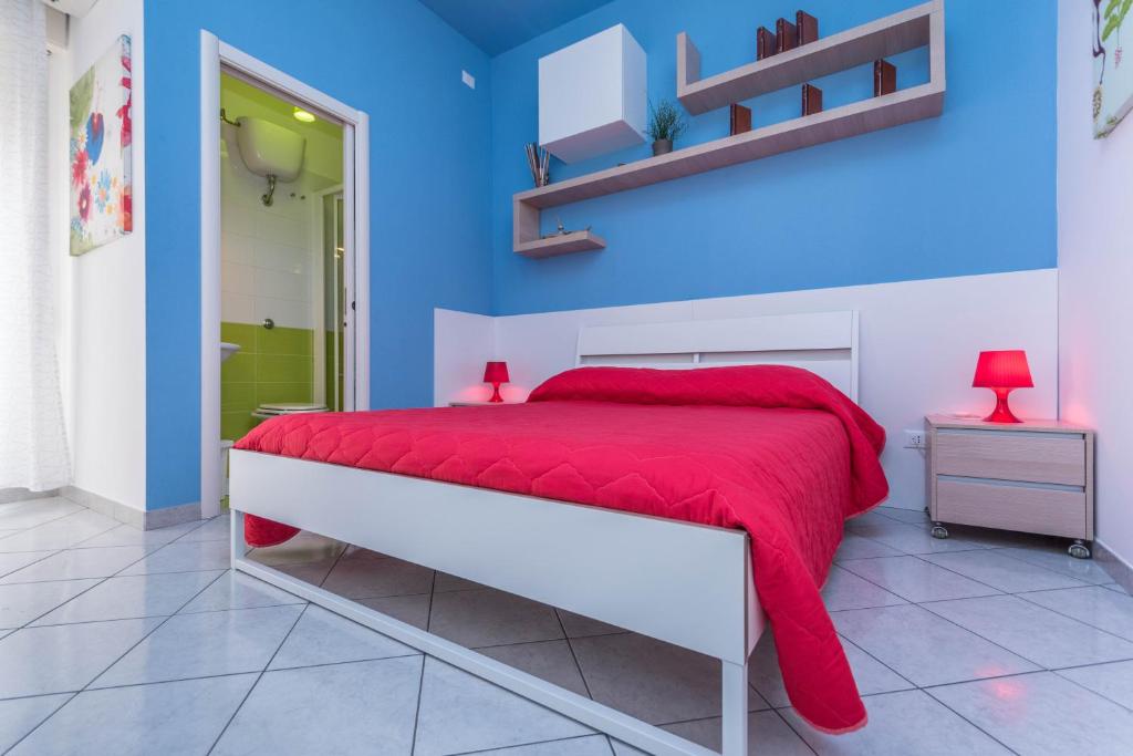 A bed or beds in a room at Il Muretto