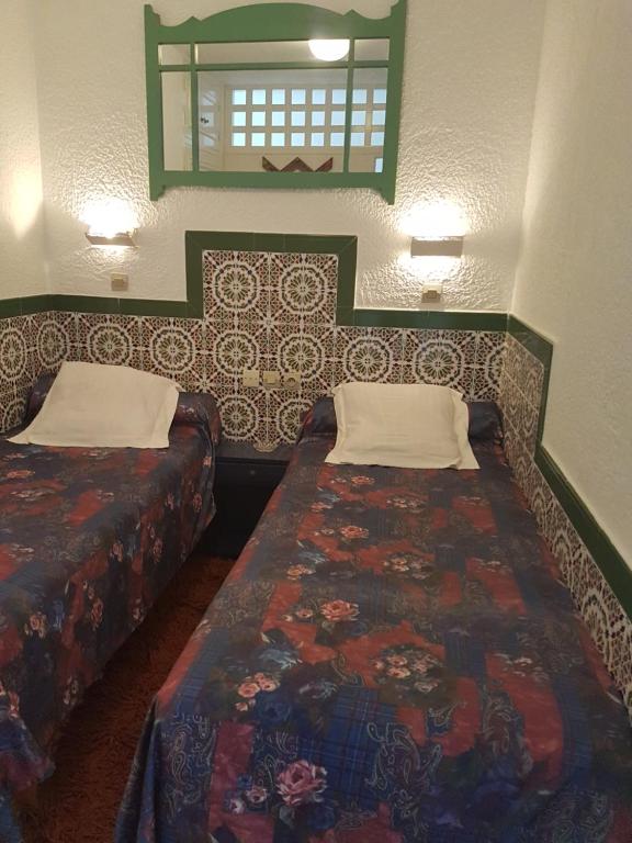 Postel nebo postele na pokoji v ubytování Residence Yasmina Agadir