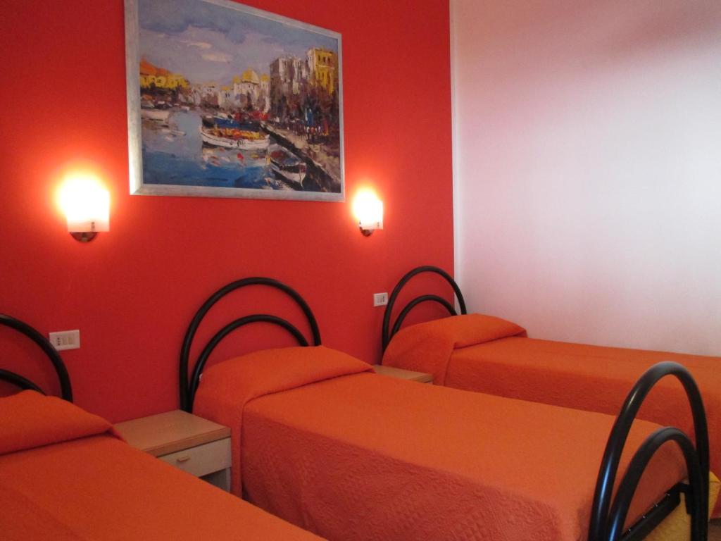 Posteľ alebo postele v izbe v ubytovaní Palinuro casa vacanze "Donna Antonia"