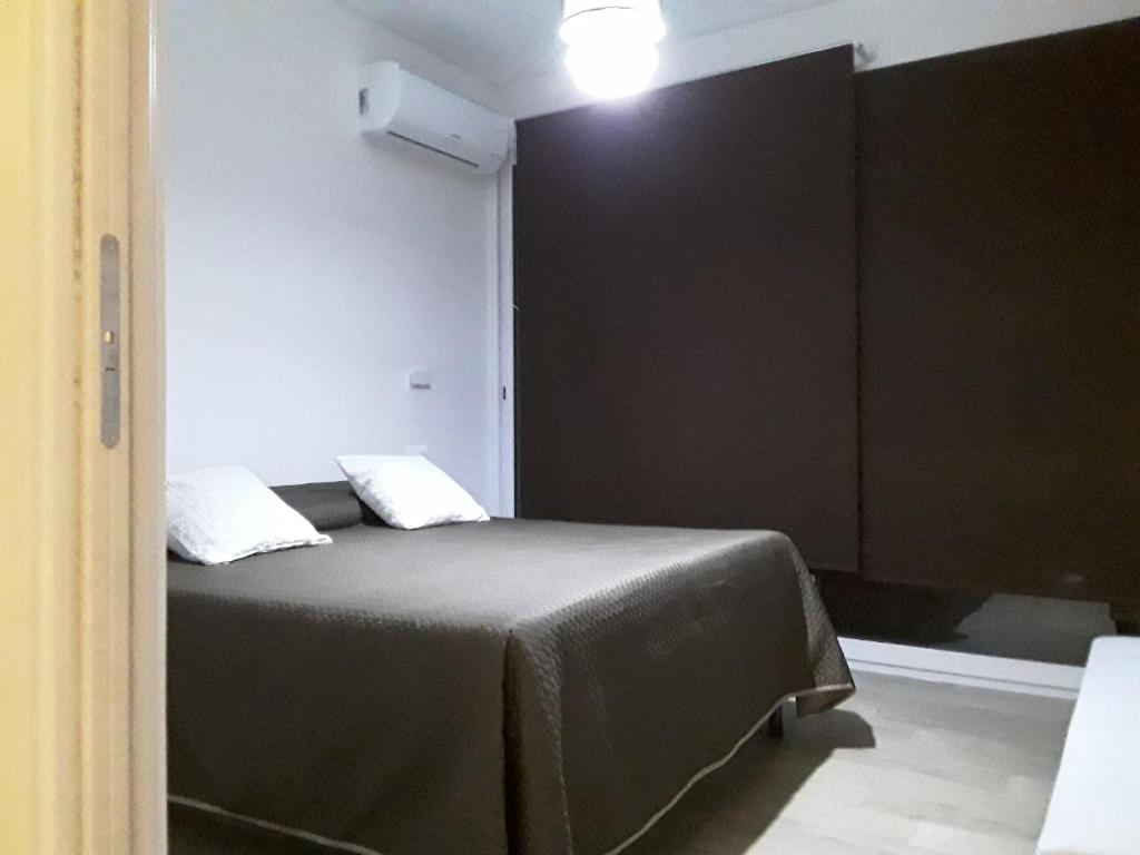 Łóżko lub łóżka w pokoju w obiekcie Villa sul porto