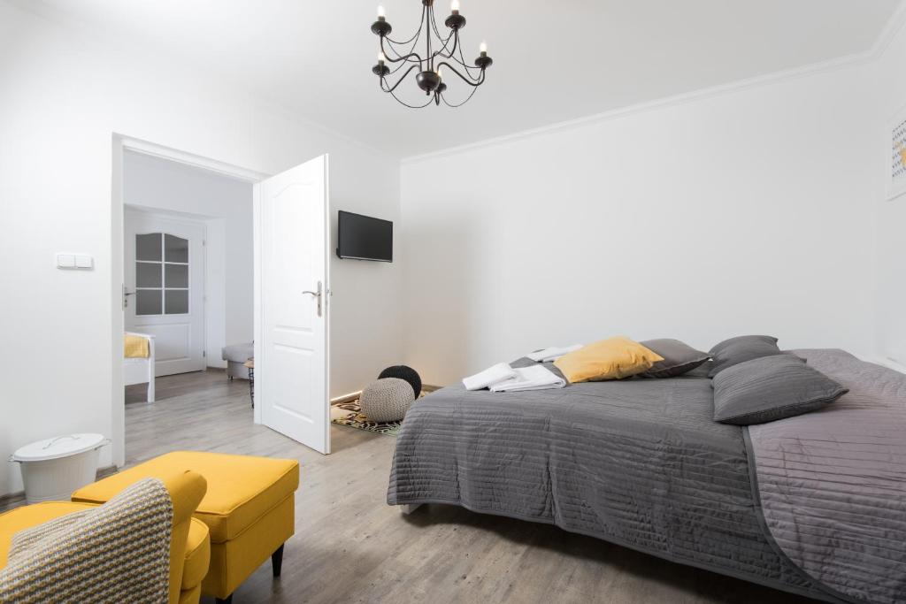 Postel nebo postele na pokoji v ubytování Hotel Pošta