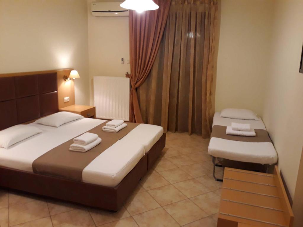 A bed or beds in a room at Al Mare