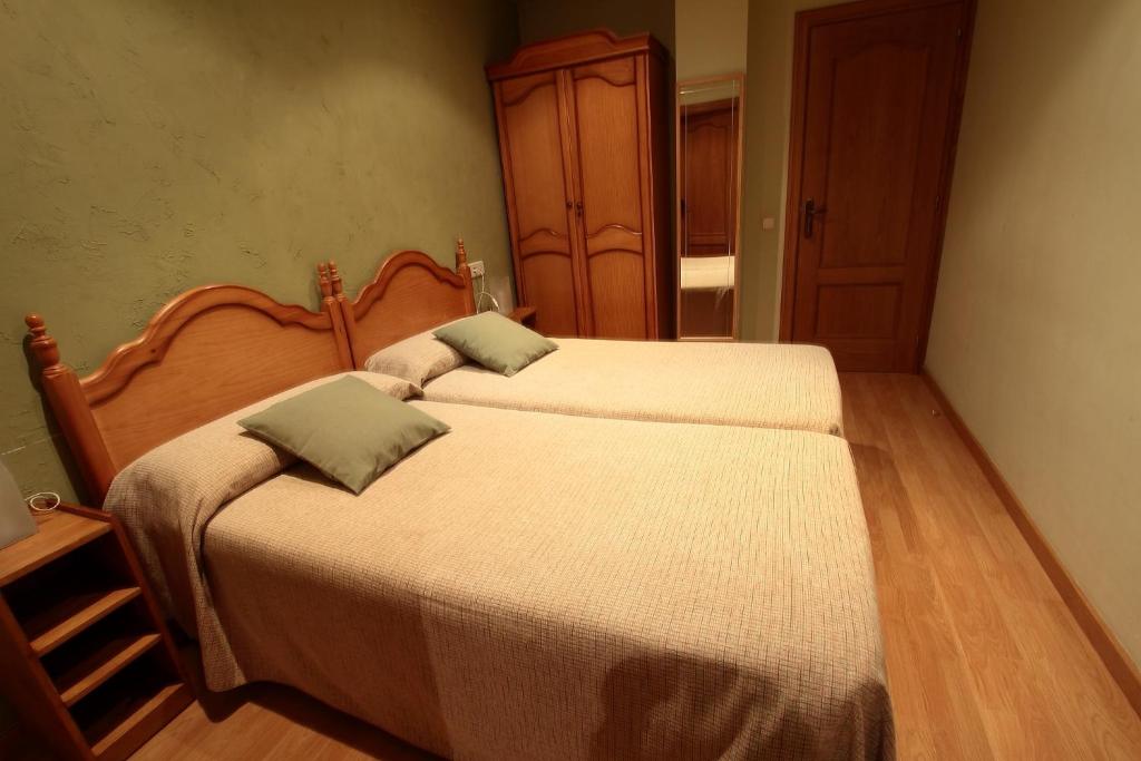 Postel nebo postele na pokoji v ubytování El Pedrís