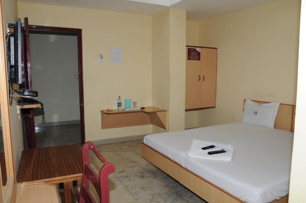 Postel nebo postele na pokoji v ubytování Hotel Chanma International