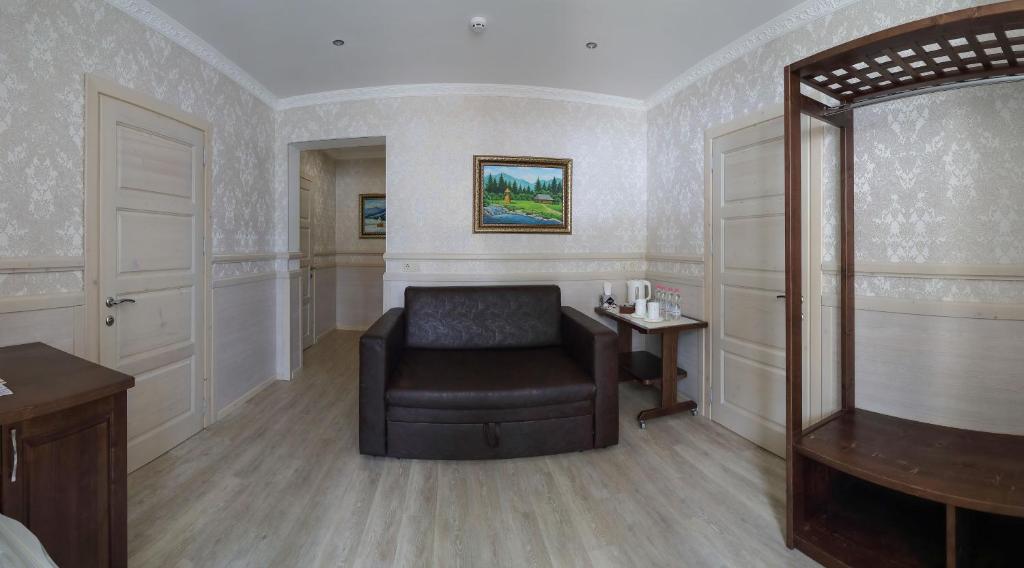 Posezení v ubytování Home Hotel