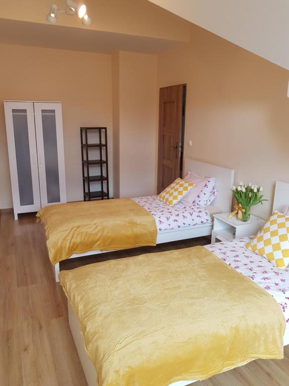 Posteľ alebo postele v izbe v ubytovaní Apartment Karpacz