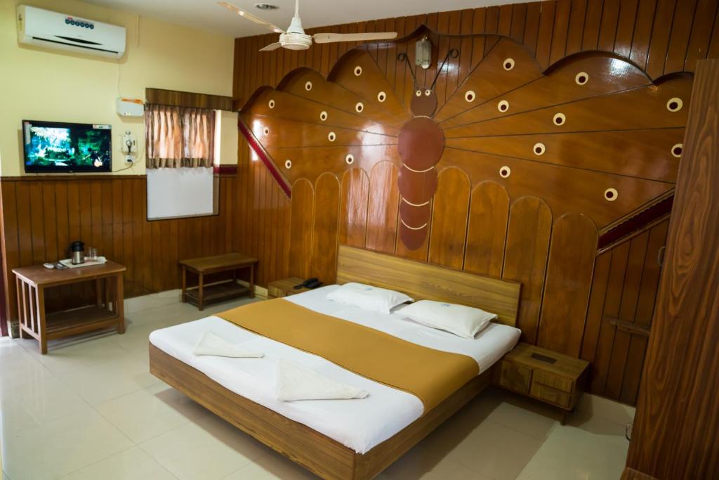 Postel nebo postele na pokoji v ubytování Hotel Chanma International