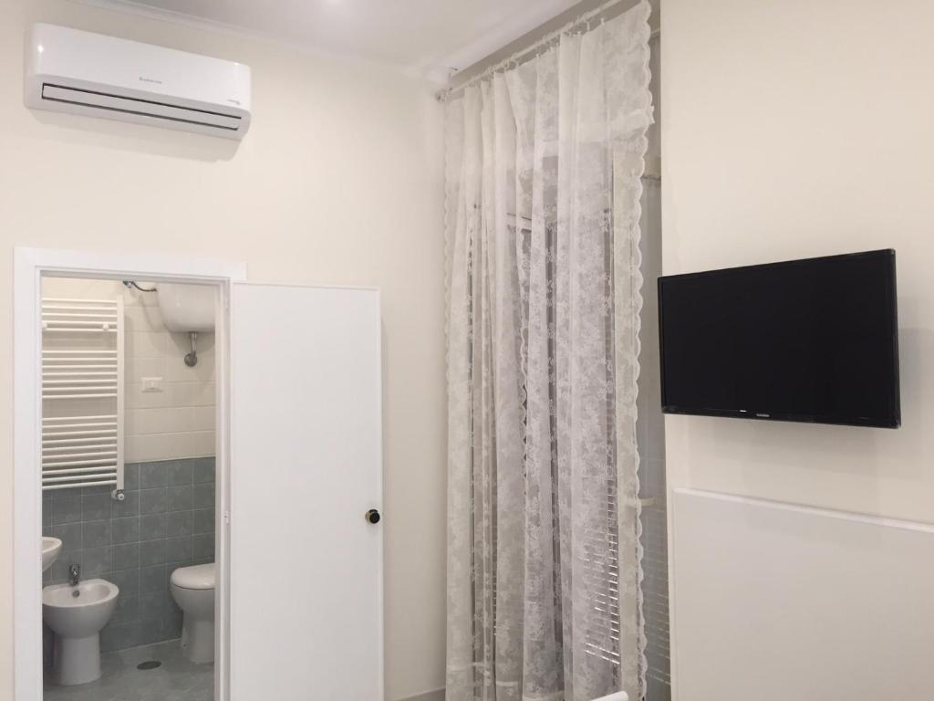 Koupelna v ubytování Albergo Oasi