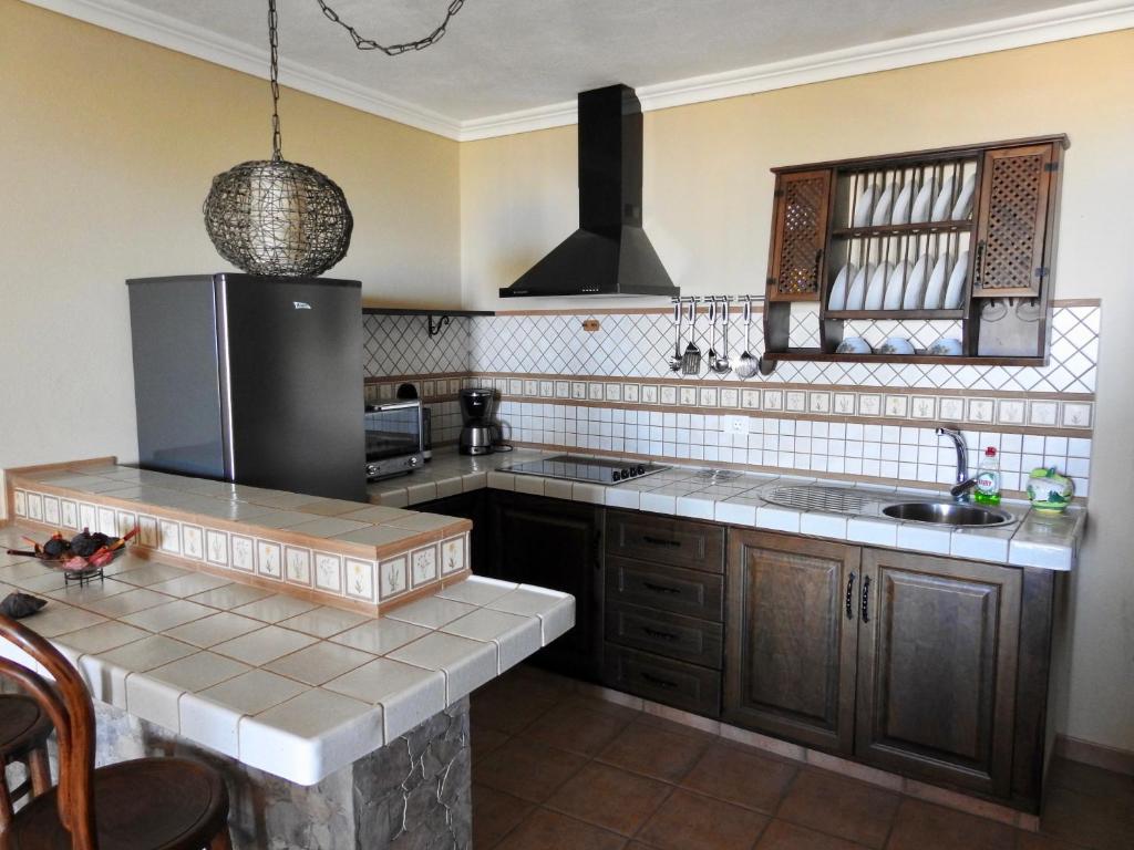 Kuchyň nebo kuchyňský kout v ubytování Casa Cueva de las Palomas 2