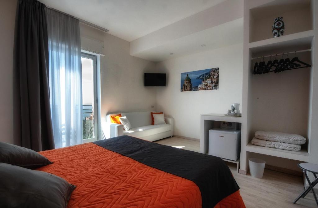 Postel nebo postele na pokoji v ubytování Sunset rooms