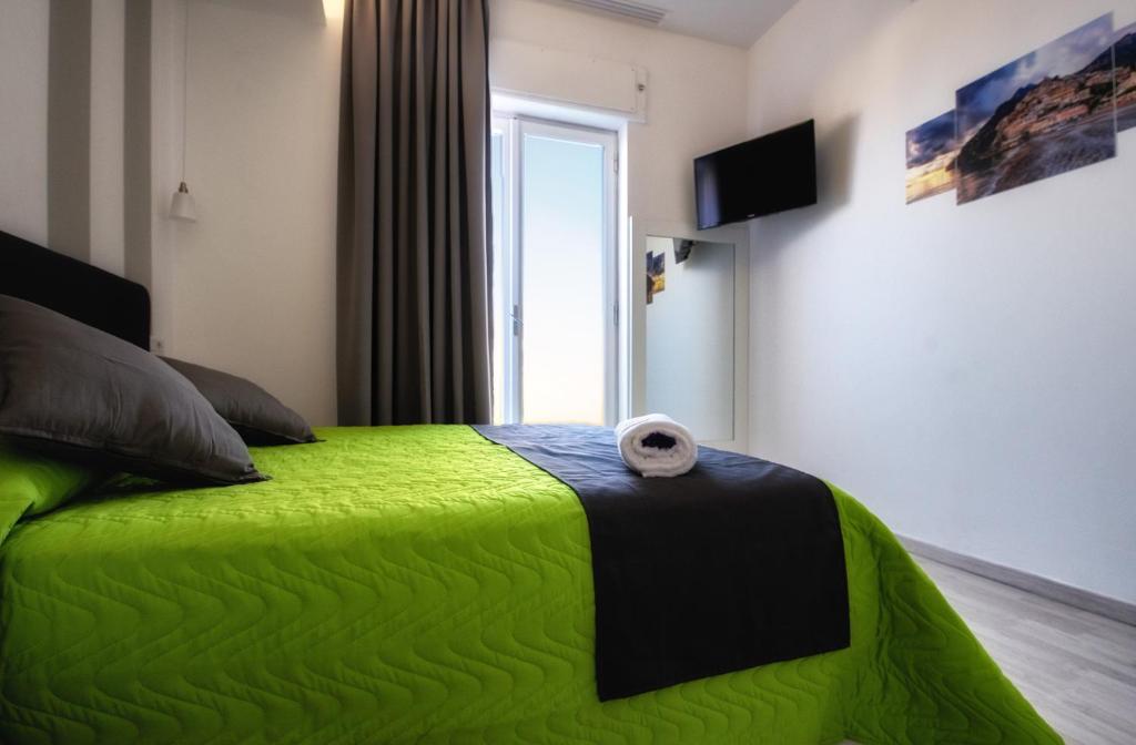 Postel nebo postele na pokoji v ubytování Sunset rooms