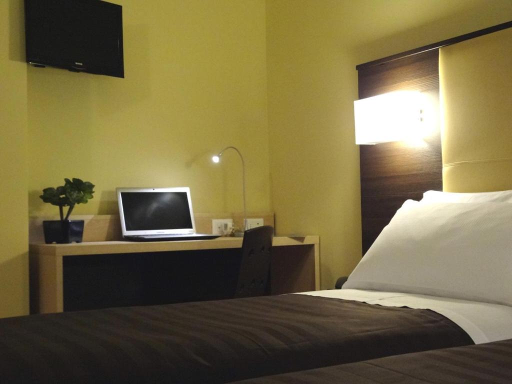TV a/nebo společenská místnost v ubytování Hotel Alverì