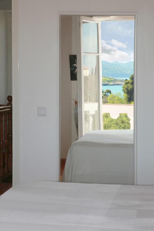 Postel nebo postele na pokoji v ubytování Villa Ancora Spetses