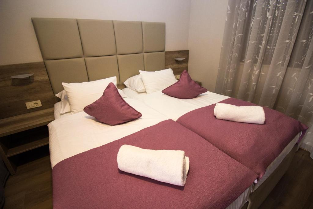 Postel nebo postele na pokoji v ubytování Villa Divani