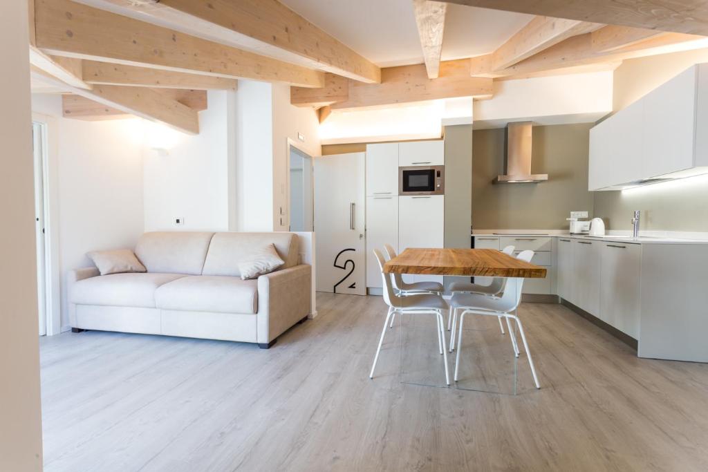 A kitchen or kitchenette at La Giostra Home Apartments