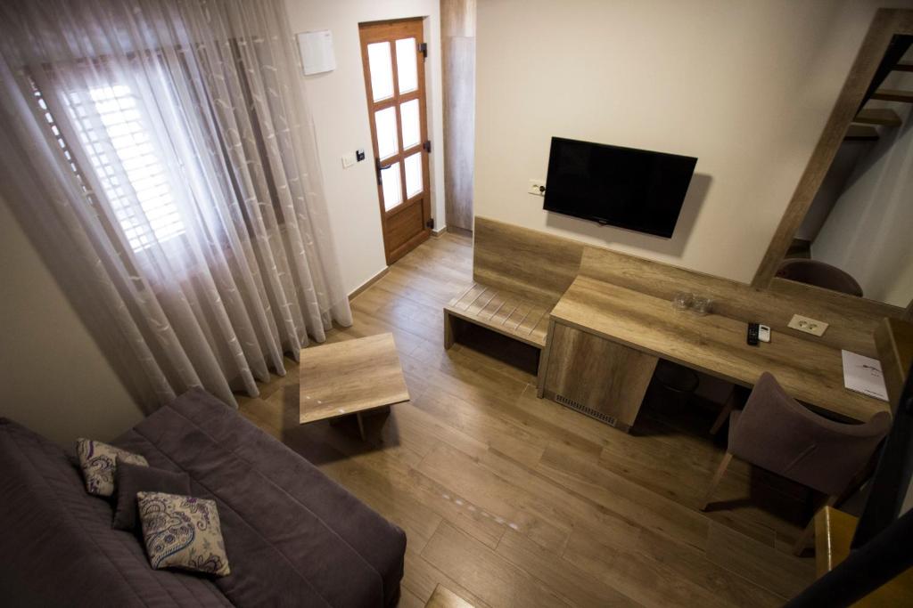 TV a/nebo společenská místnost v ubytování Villa Divani