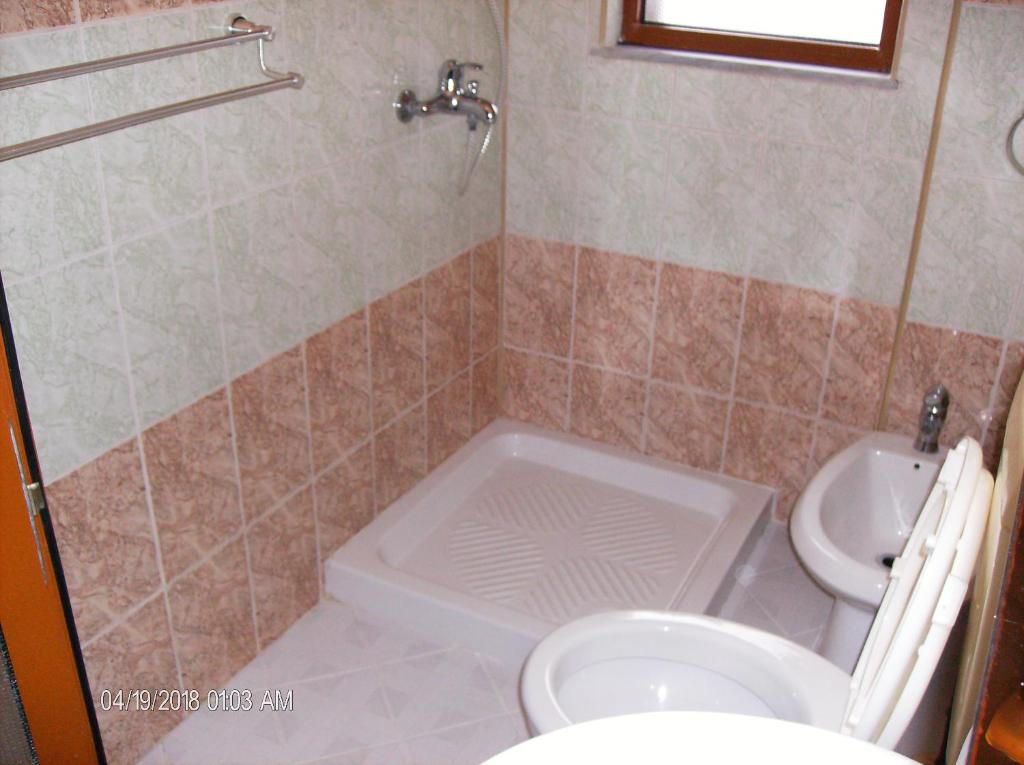 Koupelna v ubytování Amras house