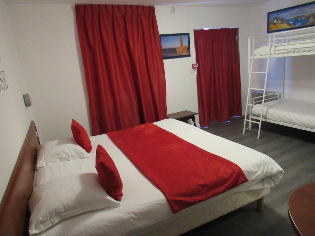 Postel nebo postele na pokoji v ubytování Citotel Les Sternes