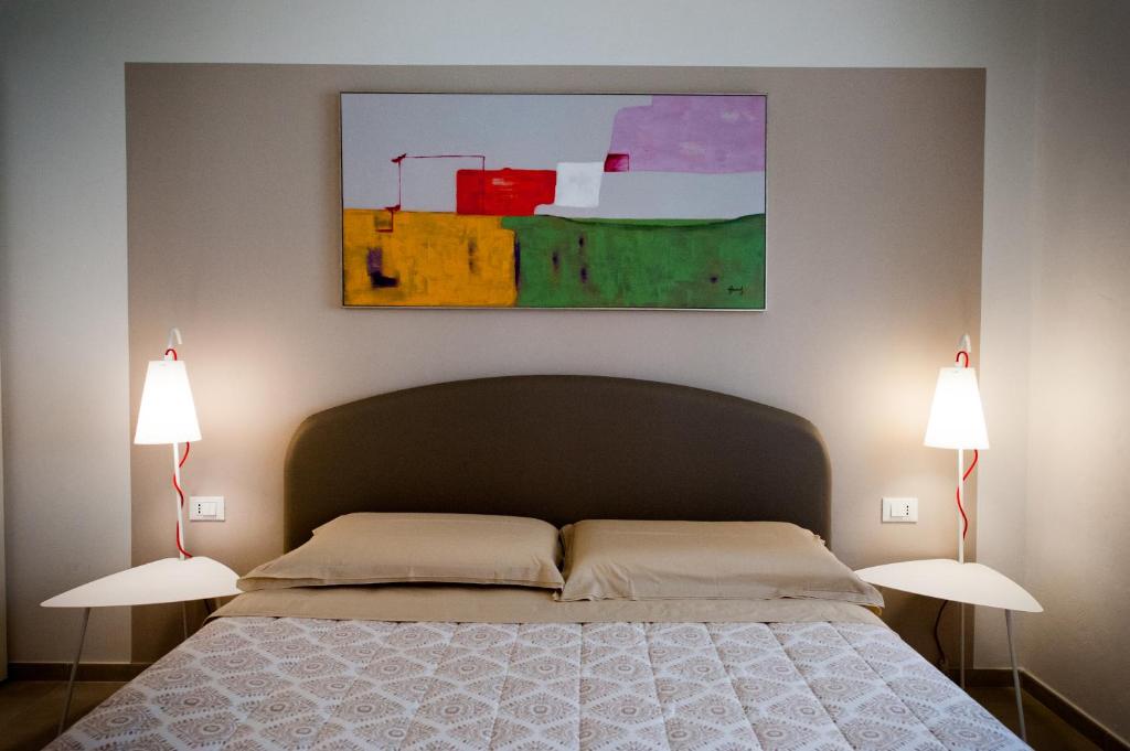 Postel nebo postele na pokoji v ubytování Daniela B&B Fiera