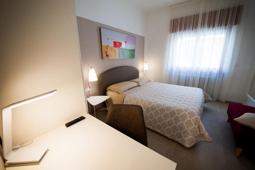 Postel nebo postele na pokoji v ubytování Daniela B&B Fiera