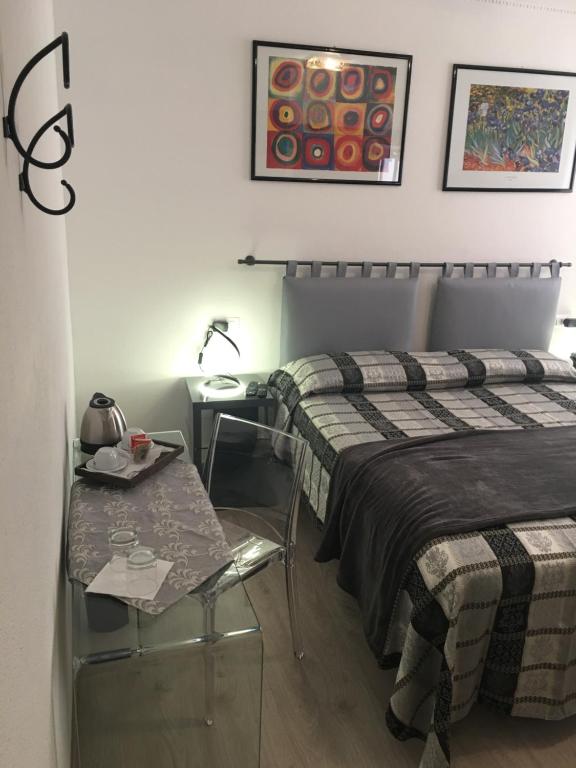 Voodi või voodid majutusasutuse Albergo Marin toas