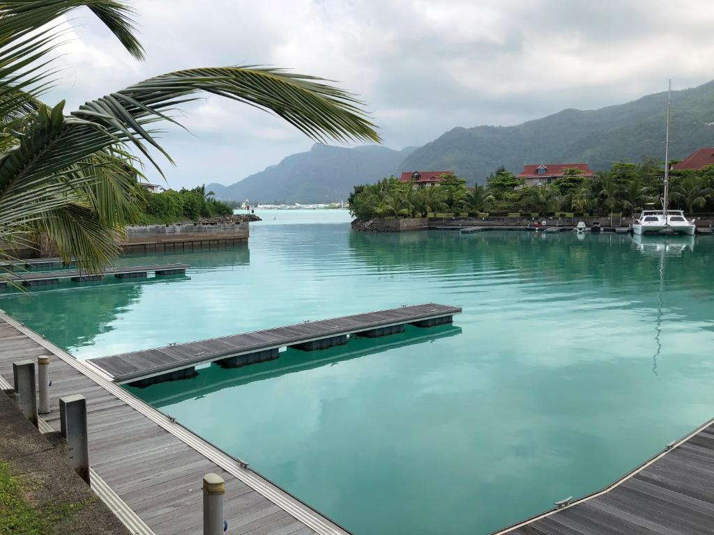 a large body of water with a boat in it at Eden Island Maison 78 (Private Pool) in Eden Island